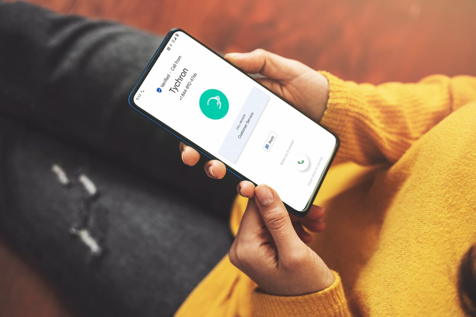 A man receiving a verified call from Tychron.